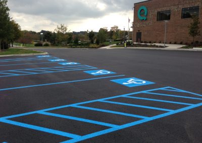 QVC sealcoating and handicap spot painting